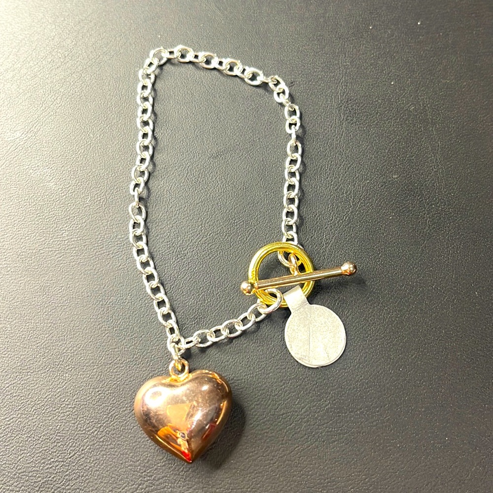 925 SS 3 color silver bracelet with a heart as charm.